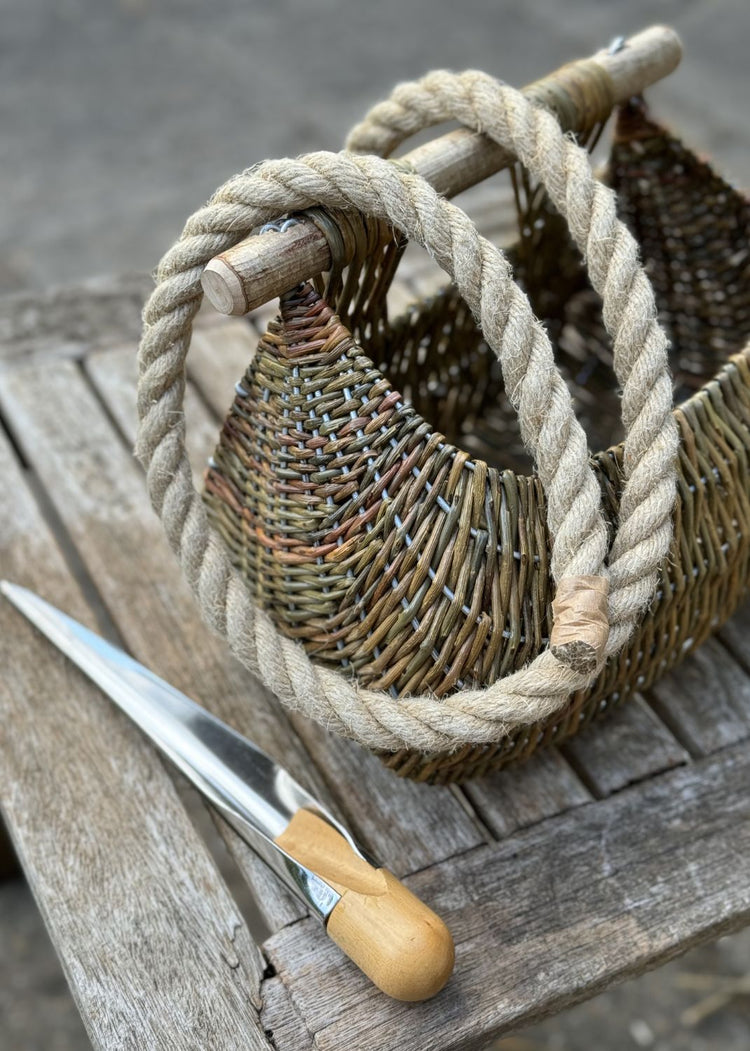 Guernsey willow baskets - ponier à cou and courge -  in spring woodland.